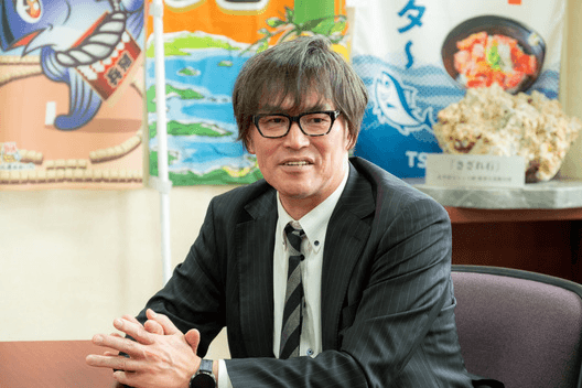 NTTドコモビジネスソリューションズ株式会社 九州支社 ソリューション営業部門 第一グループ 担当部長 足立博之